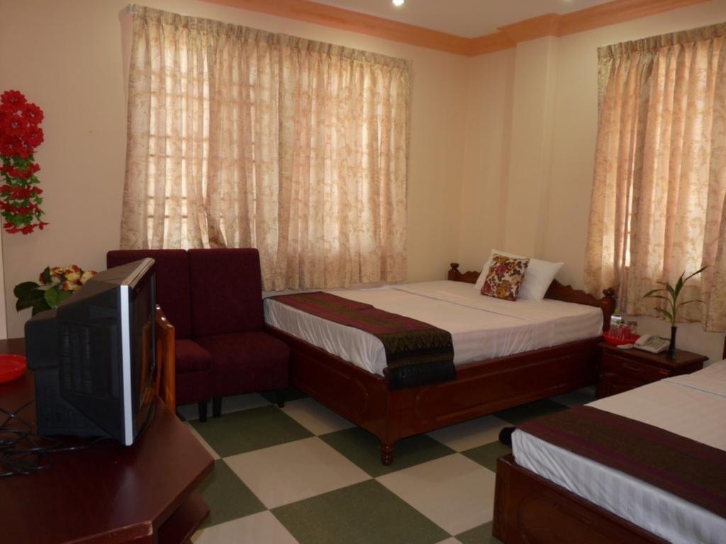 Hi Land Hotel Phnom Penh Habitación foto