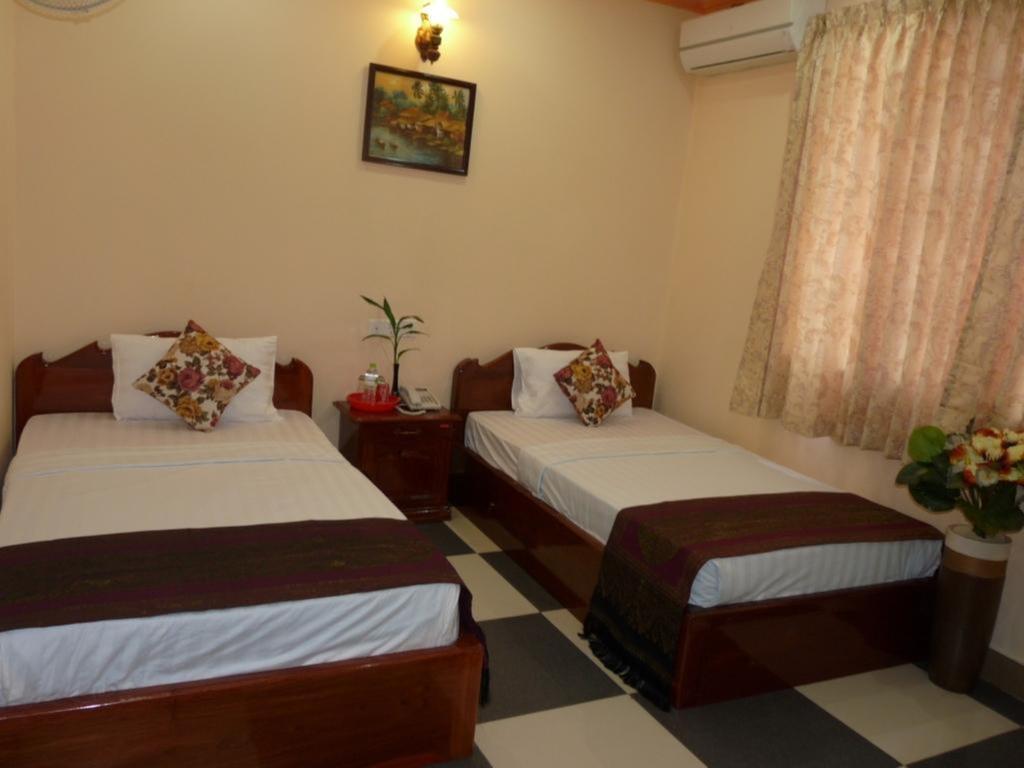 Hi Land Hotel Phnom Penh Habitación foto