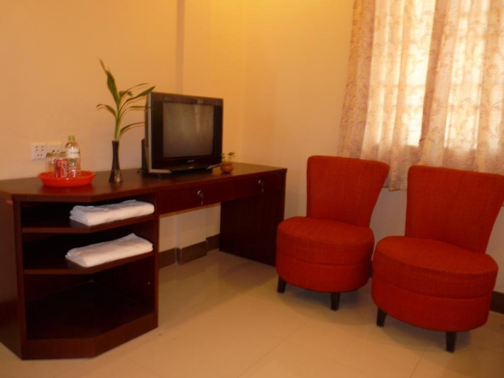 Hi Land Hotel Phnom Penh Habitación foto