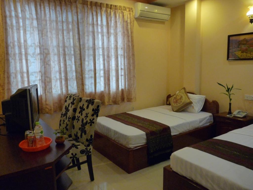 Hi Land Hotel Phnom Penh Habitación foto